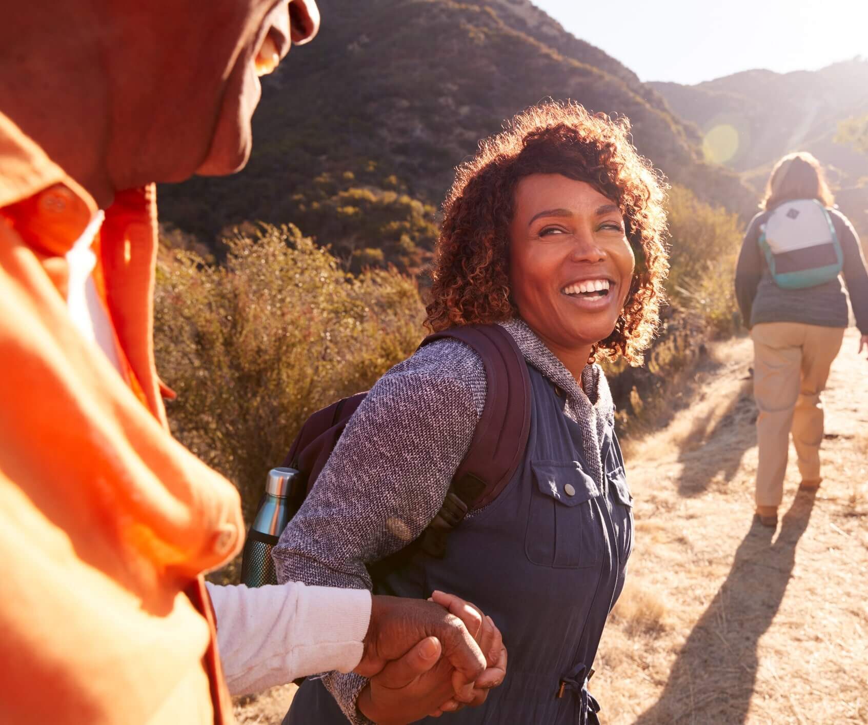 Smiling woman on a hike